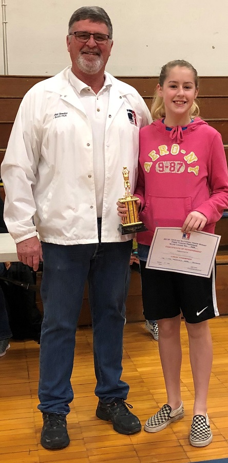190112 Hoop Shoot 5 Kaitlyn Nunley of Fremont Middle School 12 13 year old with Hoop Shoot Director Joel Buoy