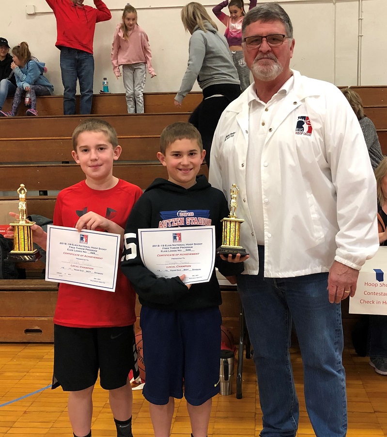 190112 Hoop Shoot 6 Joseph Fusco middle of Geneva Academy 11 12 year old with his brother Micah left and Hoop Shoot Director Joel Buoy